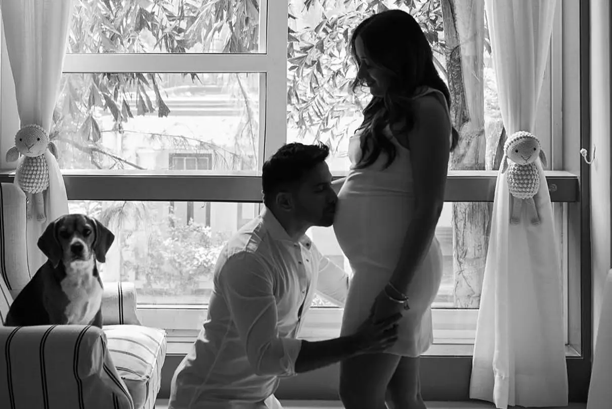 Varun Dhawan’s Wife Natasha Dalal Pregnant With First Child, Shares Cute Picture Kissing Her Baby Bump